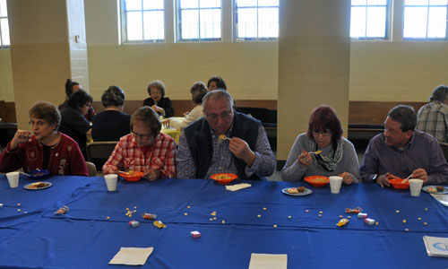 5 people eating soup